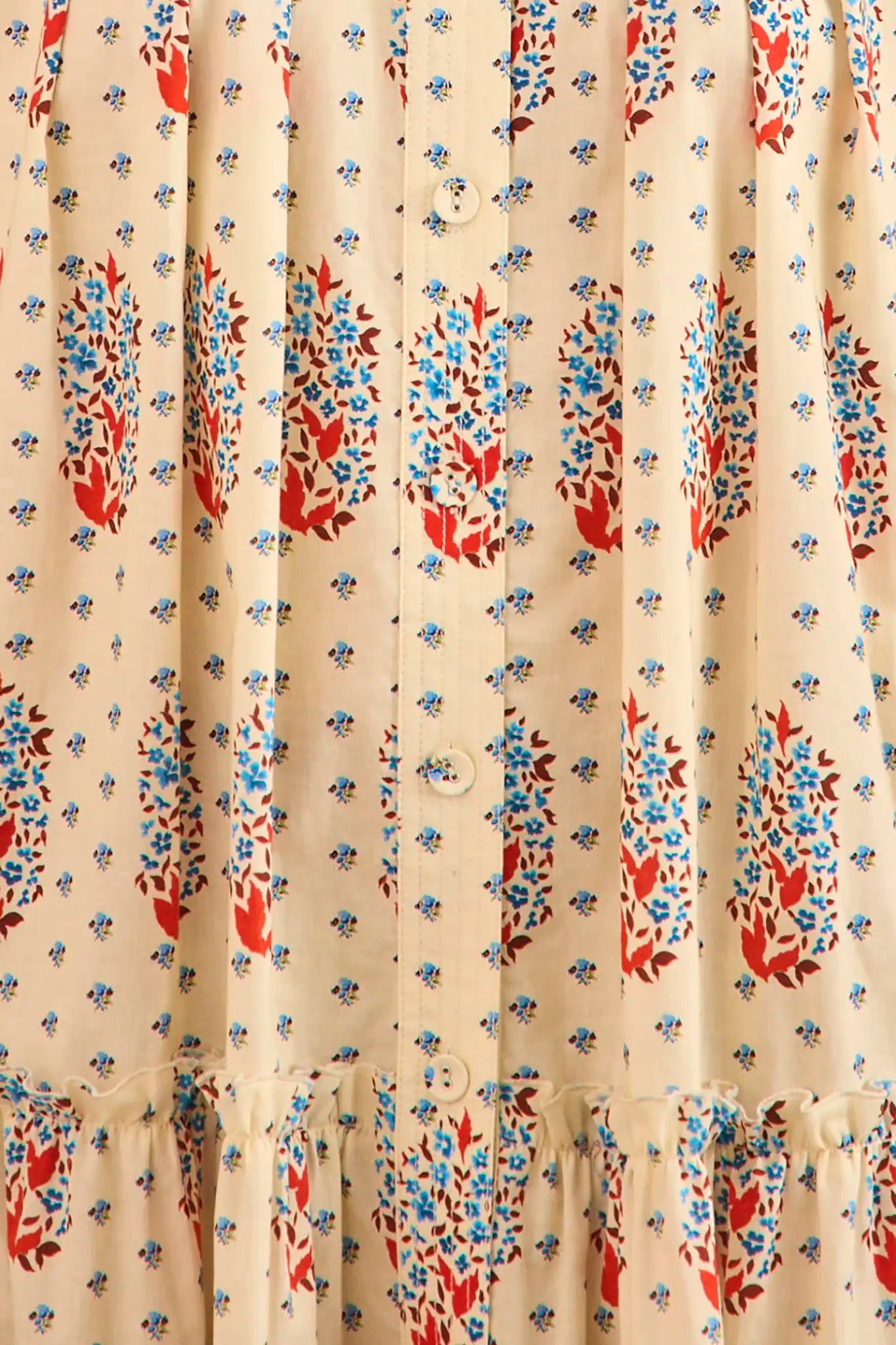 The Drifter Mini has a collared neckline, short puff sleeves, a drop waist and flounce hem.