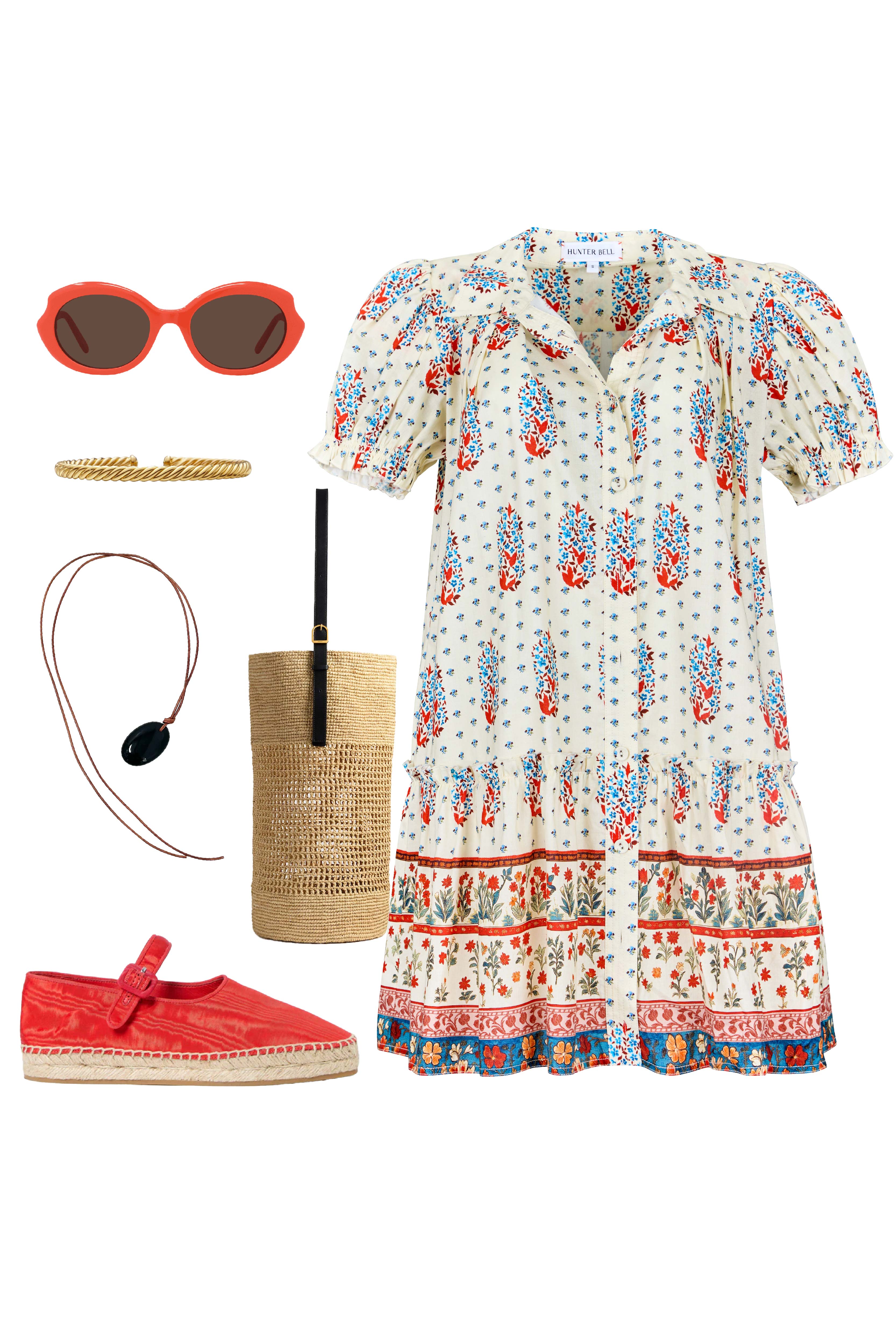 The Drifter Mini has a collared neckline, short puff sleeves, a drop waist and flounce hem.