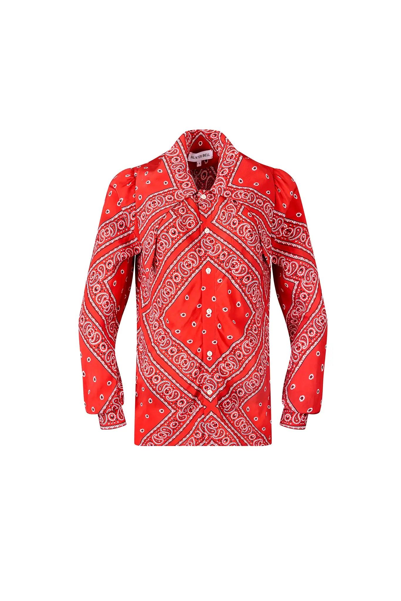 The Frances Top has a button front, long sleeves, button cuffs and a scarf collar detail.