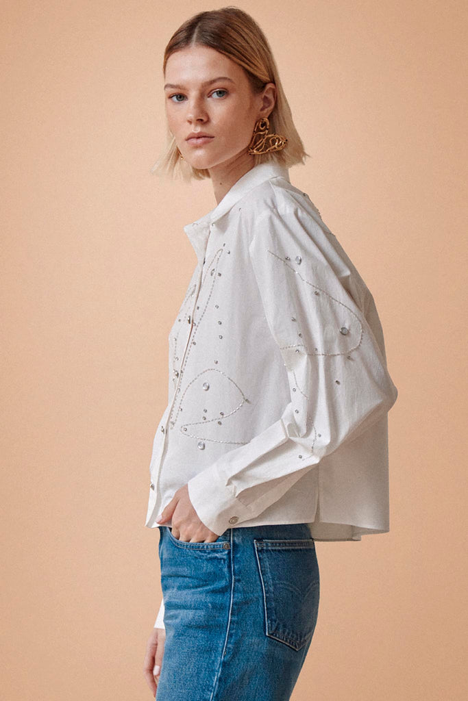 The Hudson button down has long sleeves with button cuffs and a shirt-tail hem.