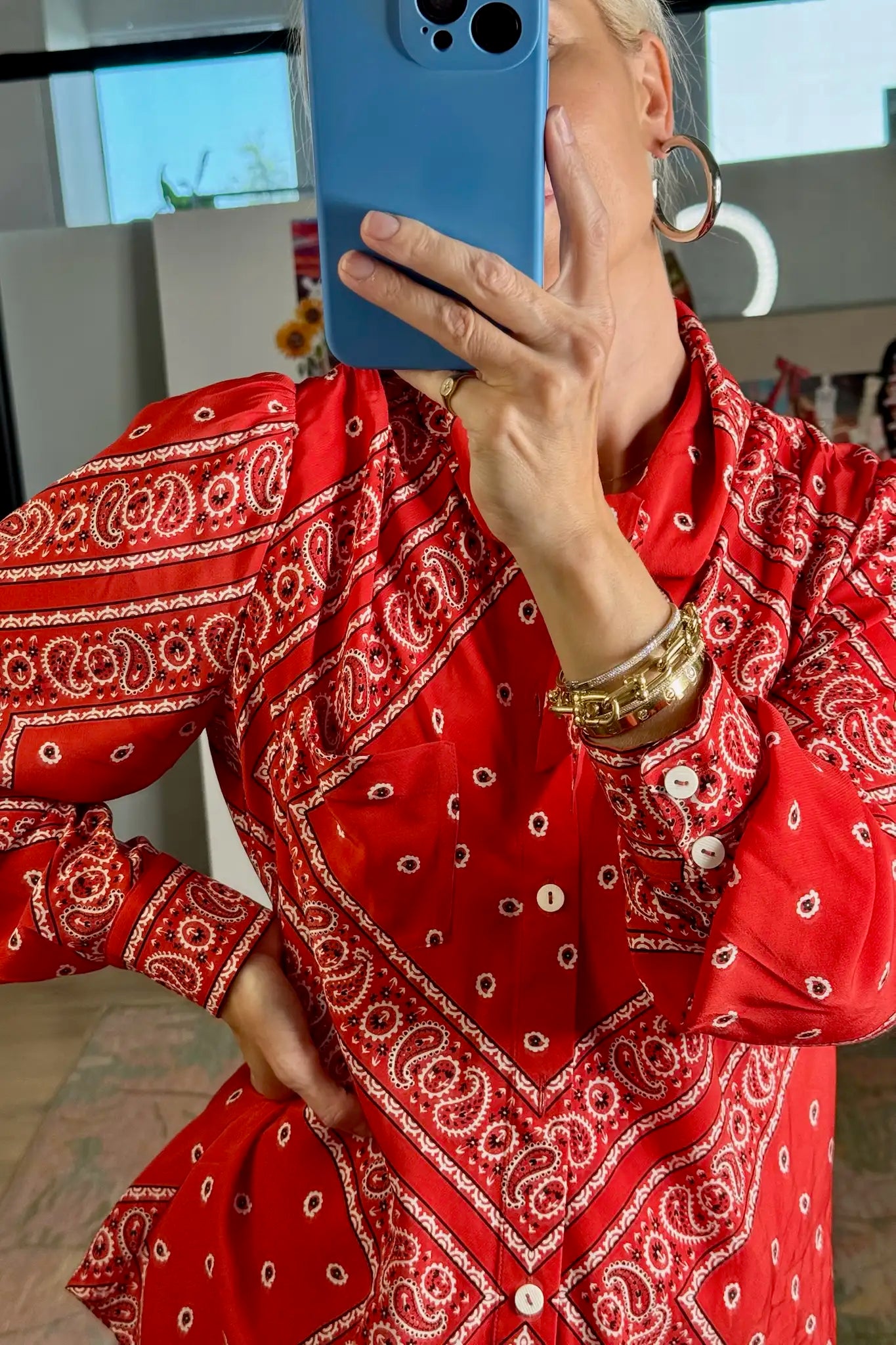 The Frances Top has a button front, long sleeves, button cuffs and a scarf collar detail.