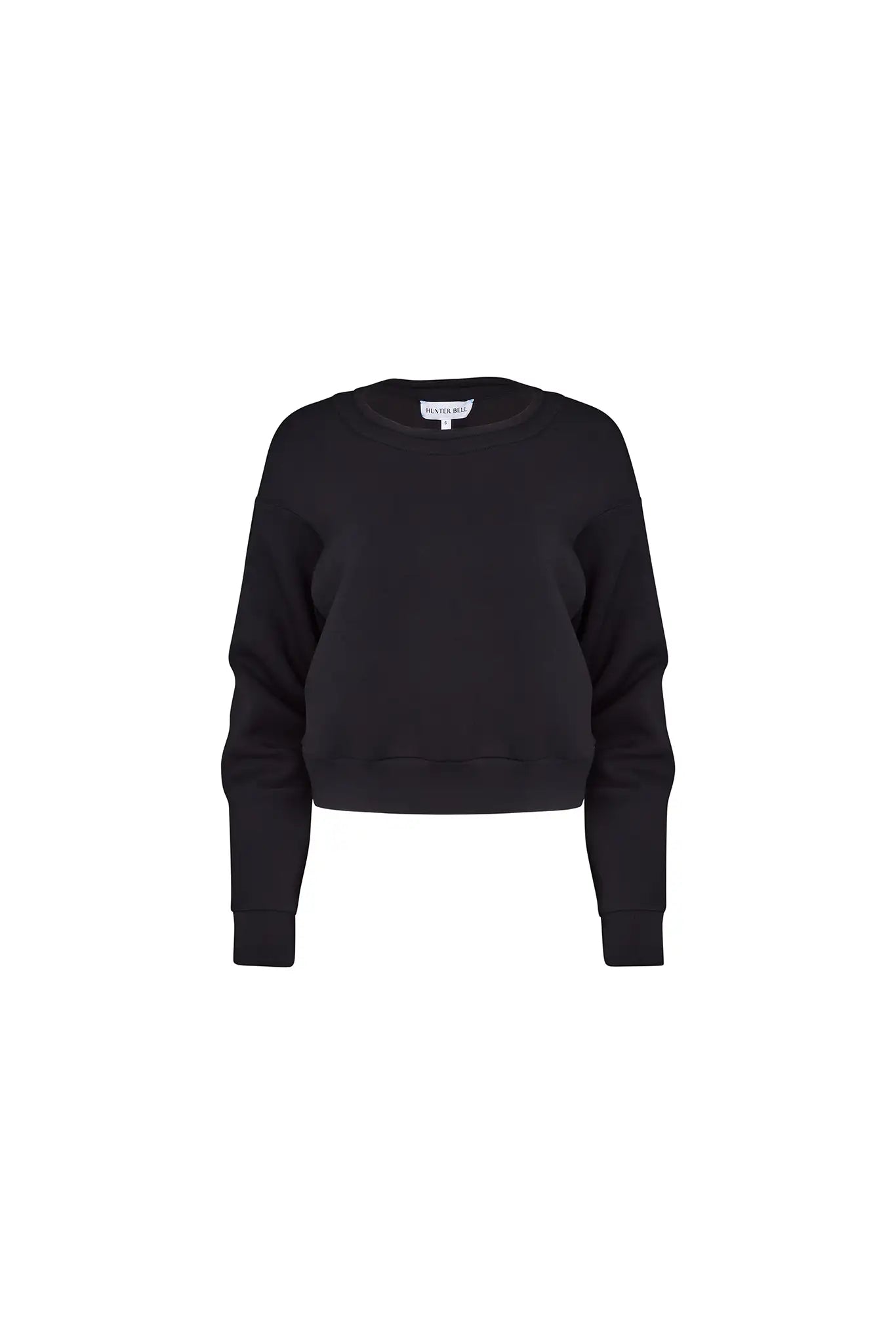 The Jennie Sweatshirt is a structured scuba in deep Onyx with pleated long sleeves.