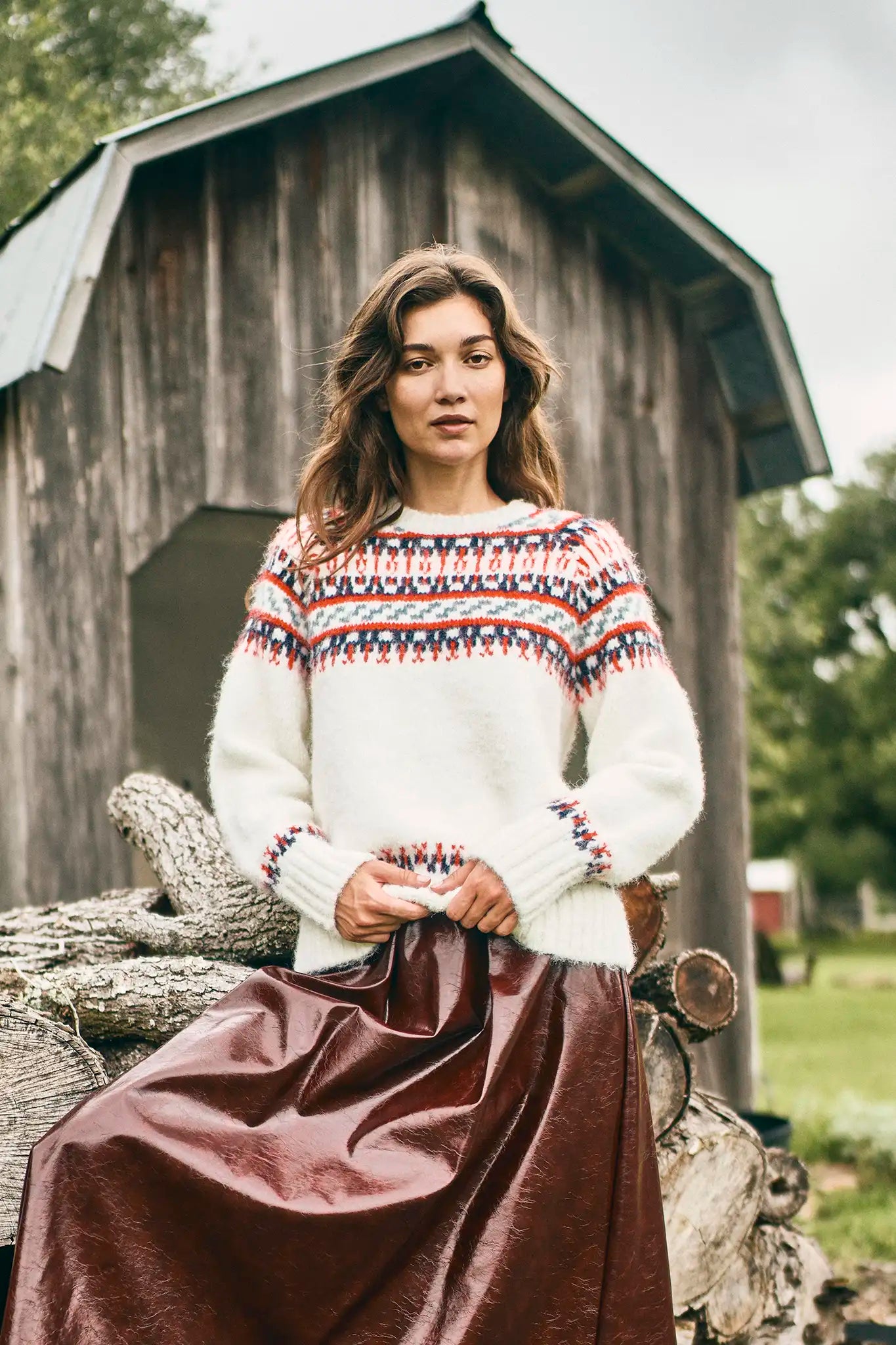 The Josie Sweater in Cream Fairisle has a ribbed crew neckline and long raglan sleeves.