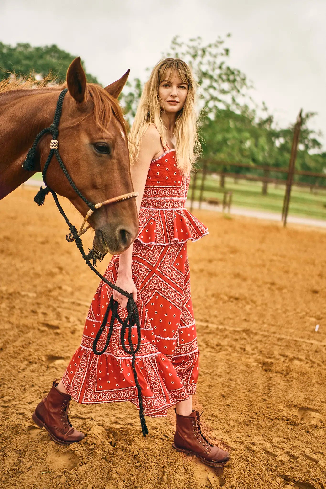 The Lacey Dress has a sweetheart neckline, quilted fitted bodice, peplum detail and contrast trim.