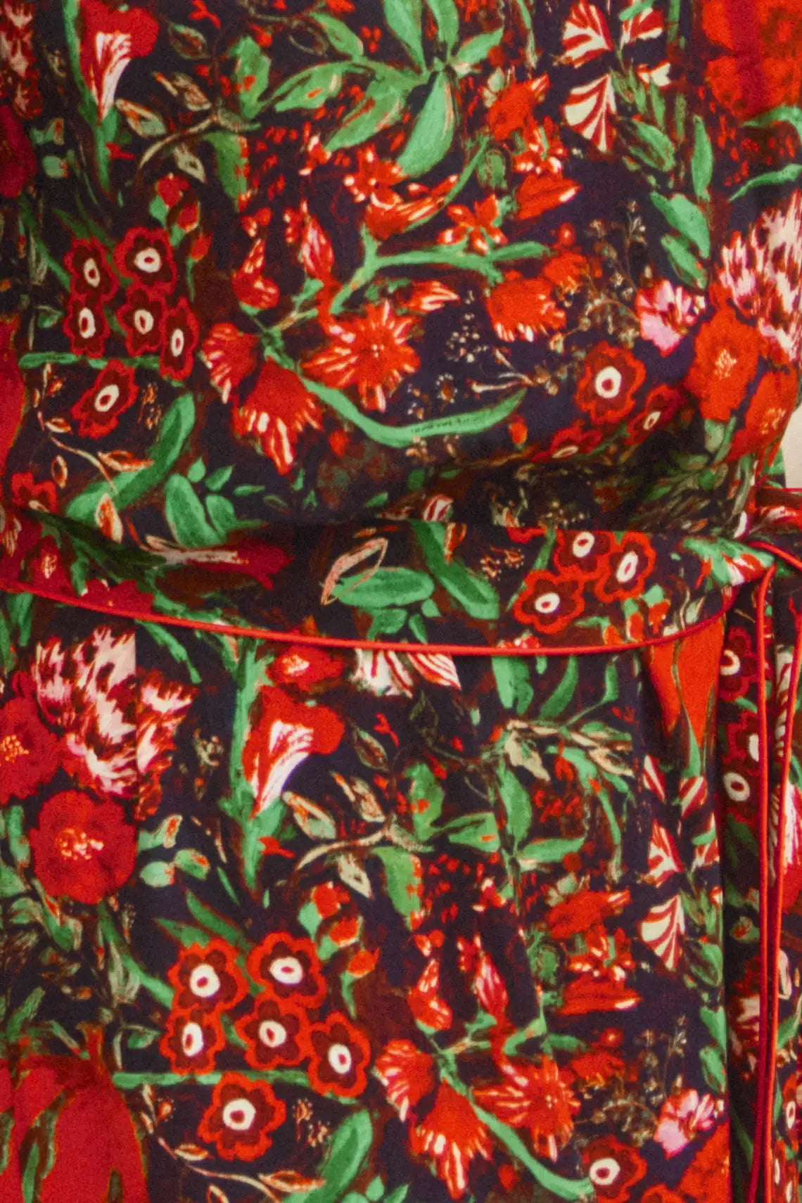 The Langley Dress is designed with a mock neck, puff sleeves, and an optional self-tie belt.