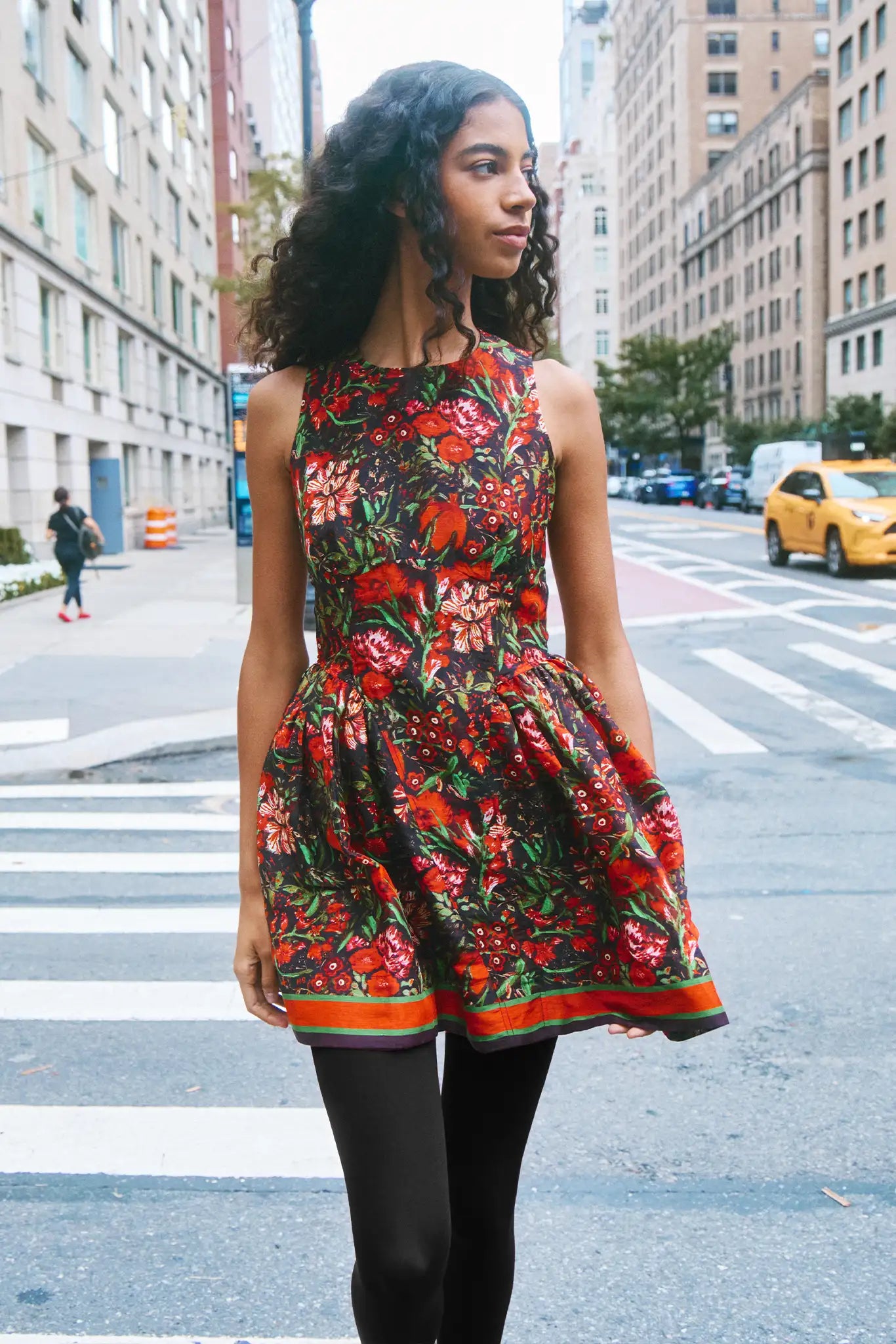 The Layne Dress is a sleeveless mini dress with a fit and flare style in our holiday floral print.