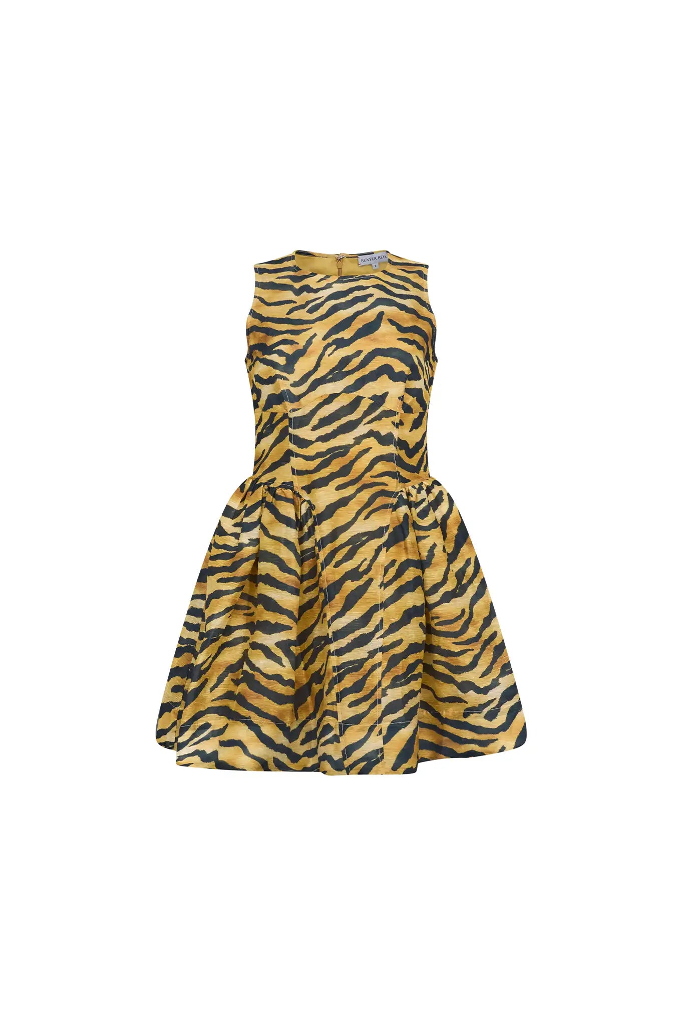 The Layne Dress is a sleeveless mini dress with a fit and flare style in our tiger print.