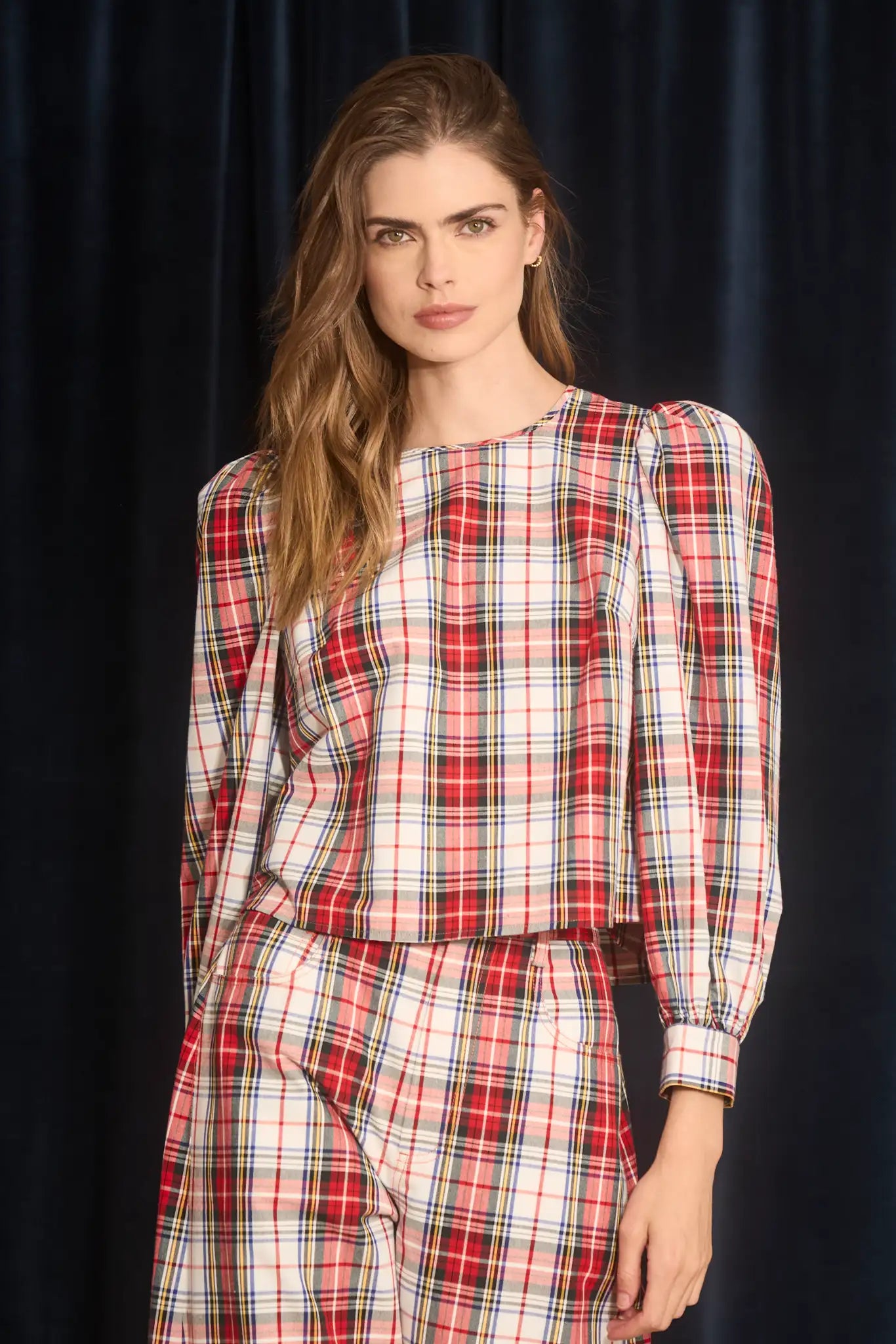 The Lottie Top has a crew neckline, black velvet ribbon ties, balloon sleeves with tailored cuffs.