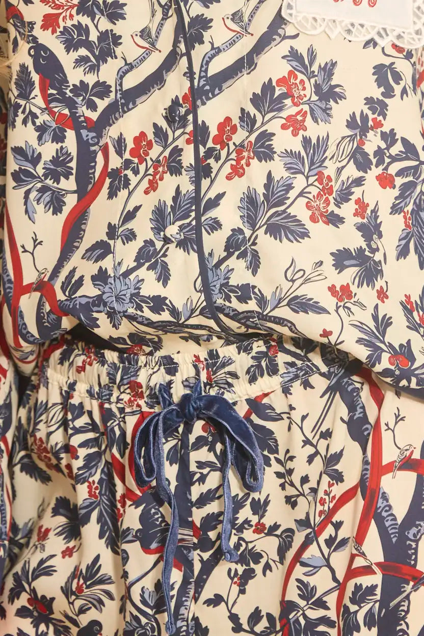 Pajama set with a long sleeve collared button front shirt and an elastic waist pull on pant.