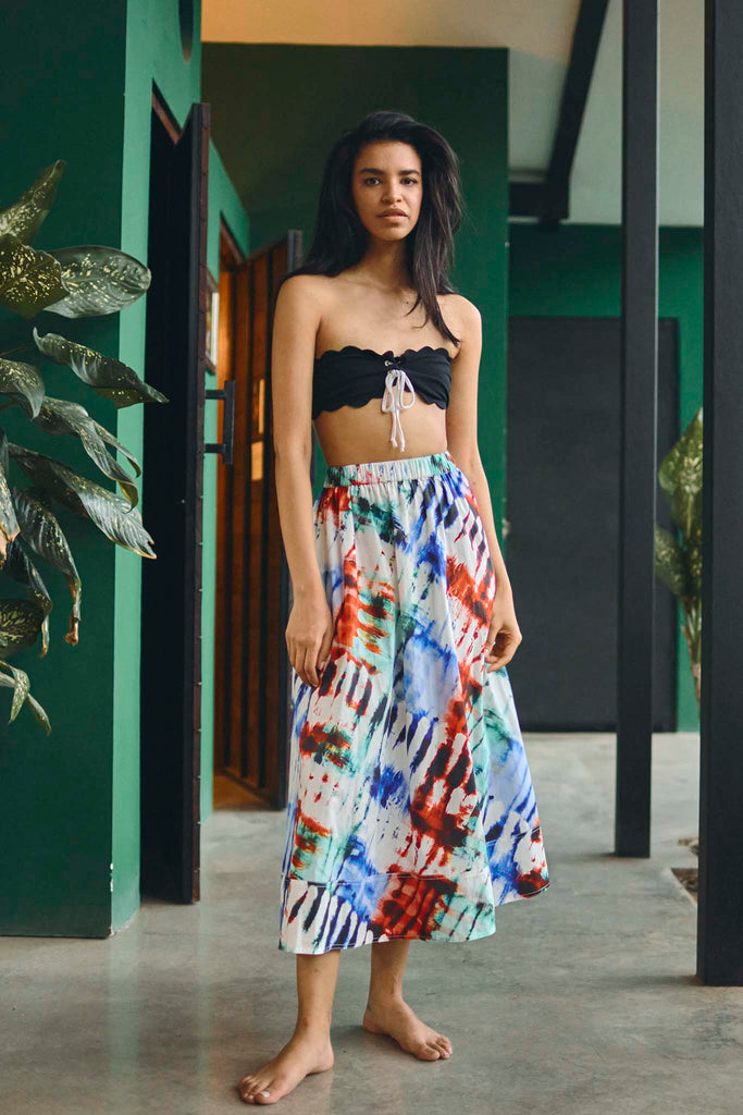 The Tatum skirt has a covered elastic waistband and relaxed fit in tie-dye print.