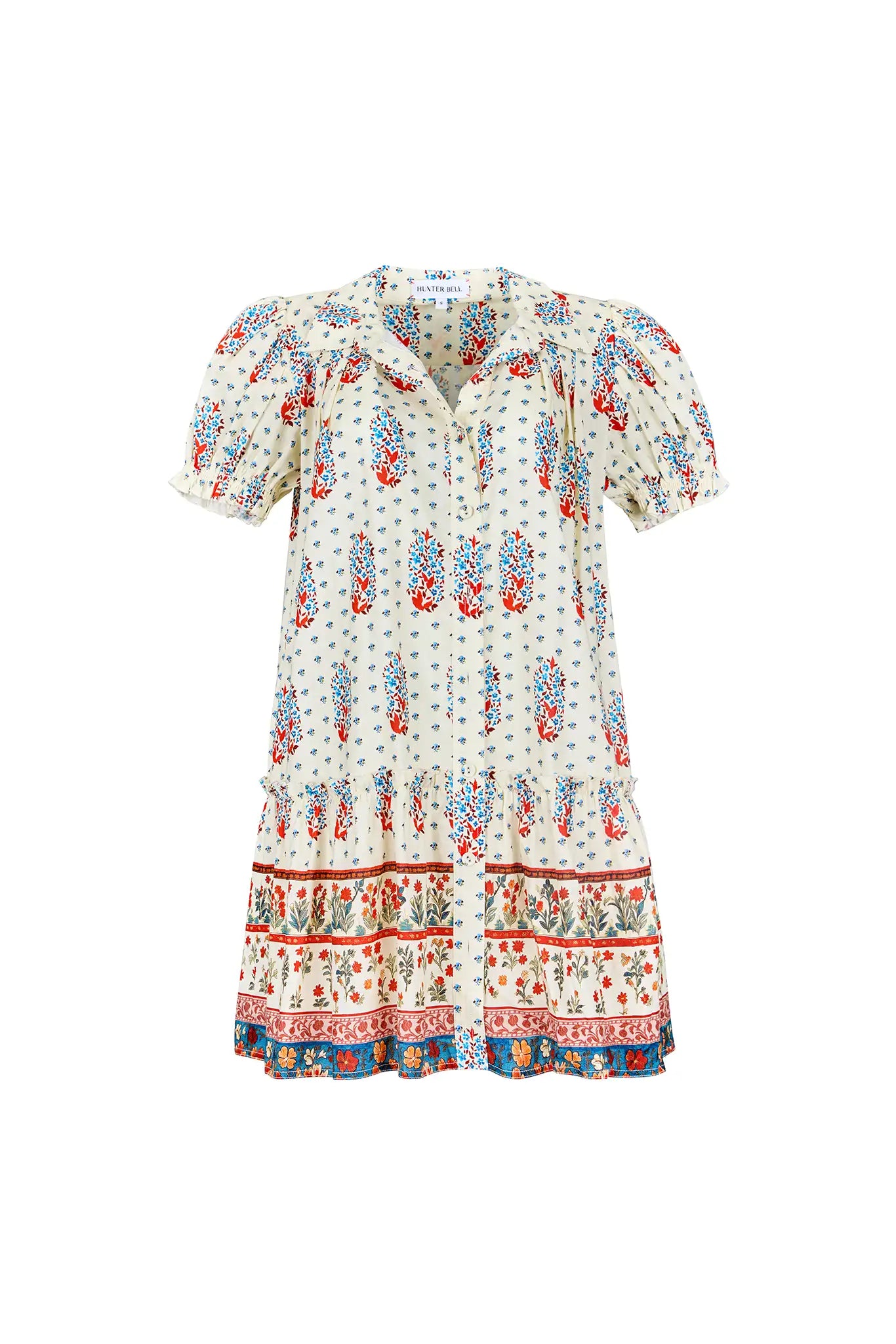 The Drifter Mini has a collared neckline, short puff sleeves, a drop waist and flounce hem.