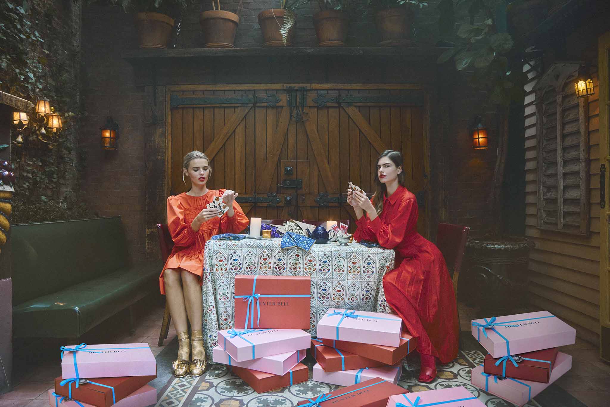 Arley Dress and Tenley Dress in red alert with the holiday gift boxes.