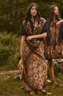 The Mare Top in Onyx paired with the Suki Skirt in Found Heirloom and the matching scarf.