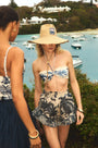 The Eden Short in Bermuda Toile paired with matching Belize Bikini Top and bottom and straw hat.