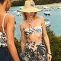 The Eden Short in Bermuda Toile paired with matching Belize Bikini Top and bottom and straw hat.