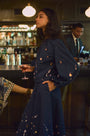 The Ida Skirt in Atelier Splatter Navy paired with the matching Rue Top. 