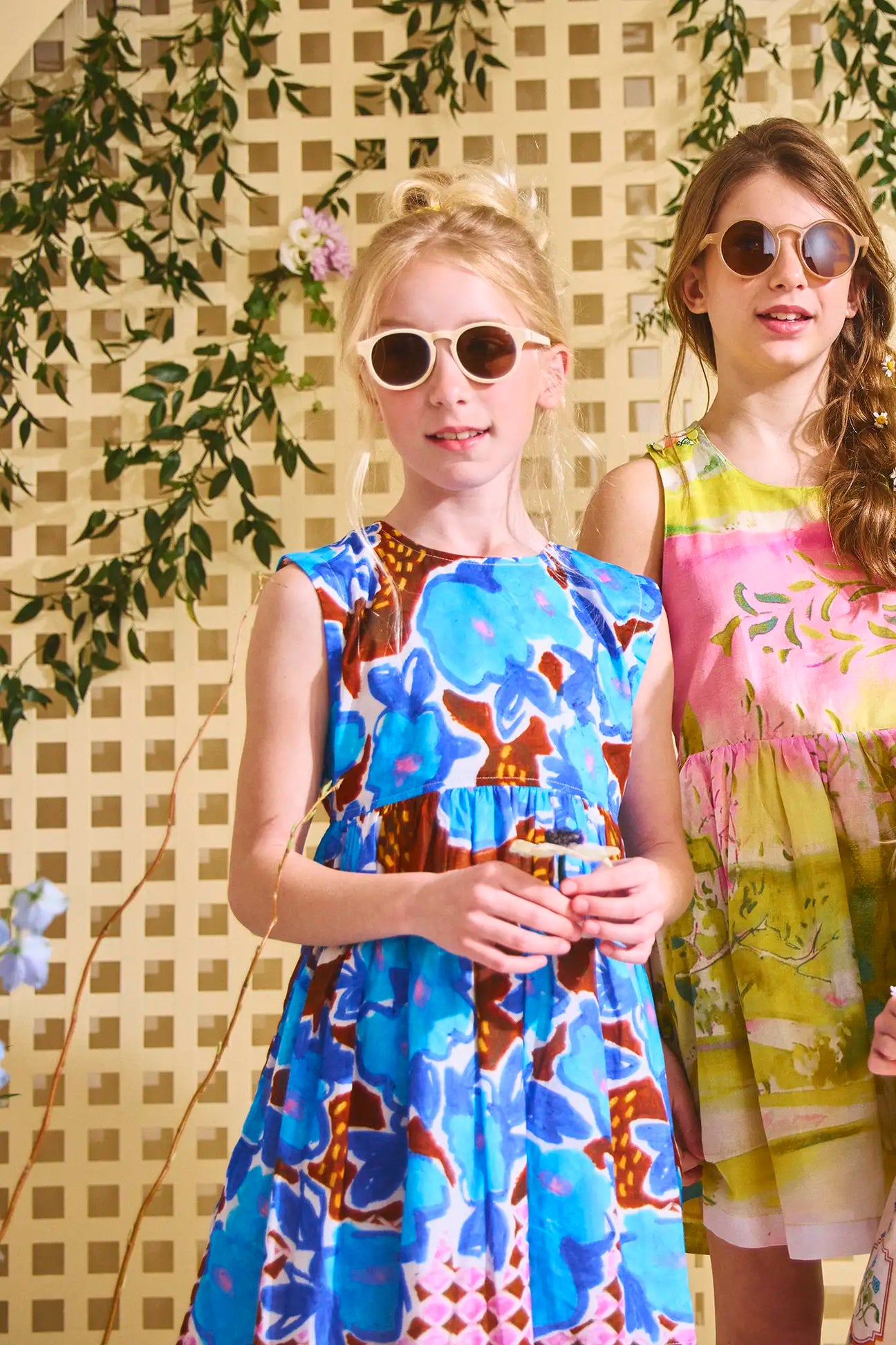 The Piper Dress is a fit-and-flare with a crew neck, a back button closure, and a knee-length skirt.