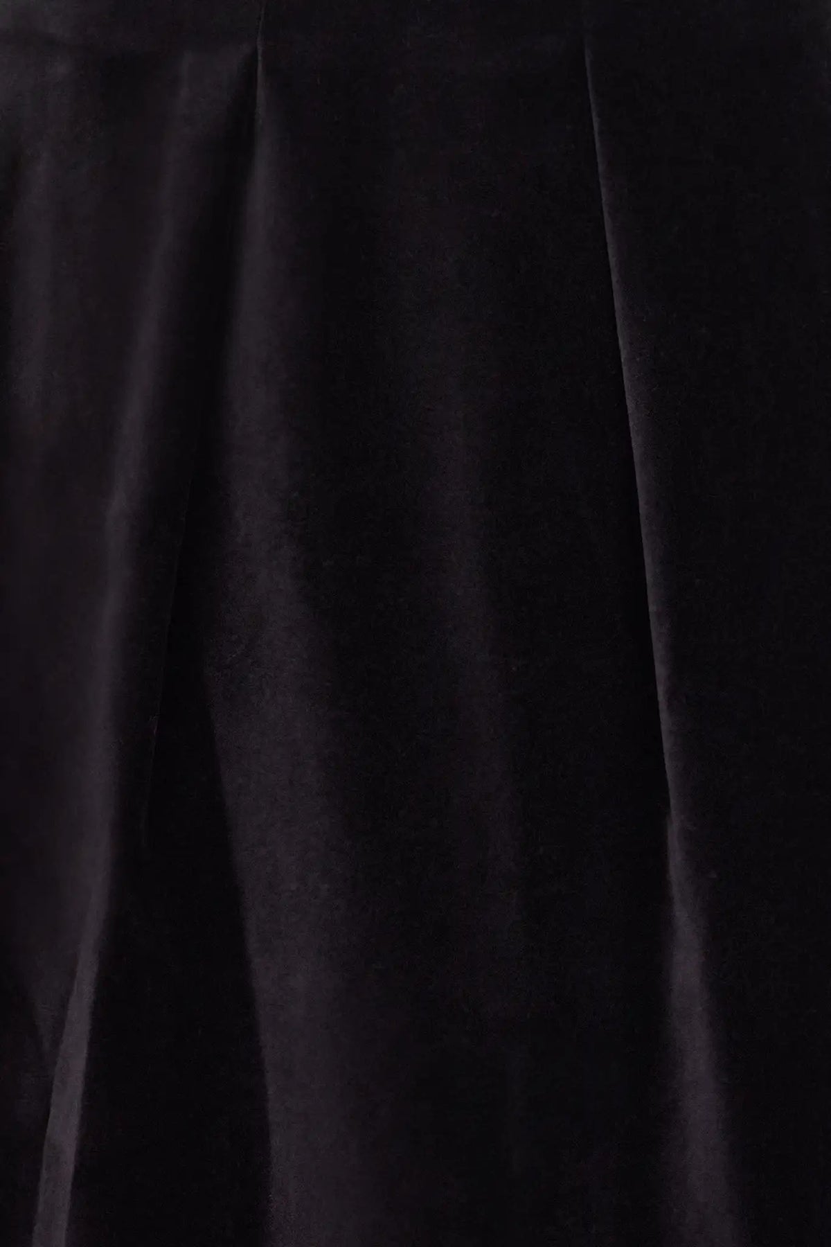 Close up of the Atlyn Skirt in Velvet Onyx. 