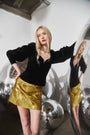 The Abrams Top in Velvet Onyx paired with the Britt Mini Skirt in Gilded Jacquard. 