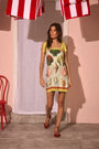 The Alba Dress, mini mint dress with colorful shells and striped straps.
