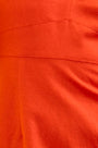 Close up of the Amal Dress in tangerine tango, spaghetti strap midi with subtle bust