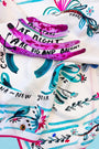 Close up of the anniversary scarf in anniversary print 