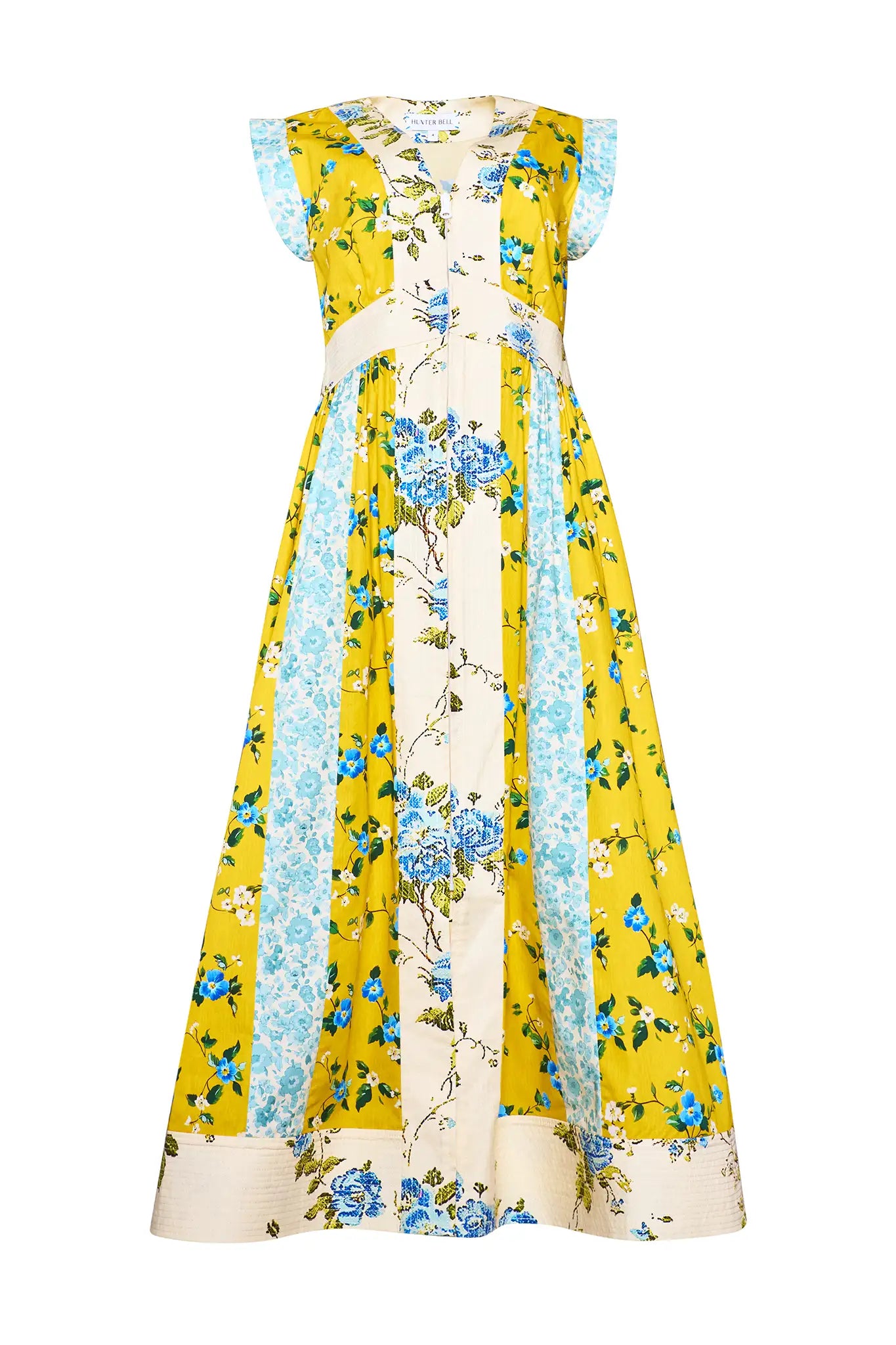 The April Dress in Middleton Meadow Mix with V-Neck, short banded sleeves, and flowing skirt.