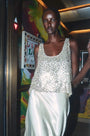 The Ashby Tank in Golden Hour paired with the Suki Skirt in Champagne on Fifth. 