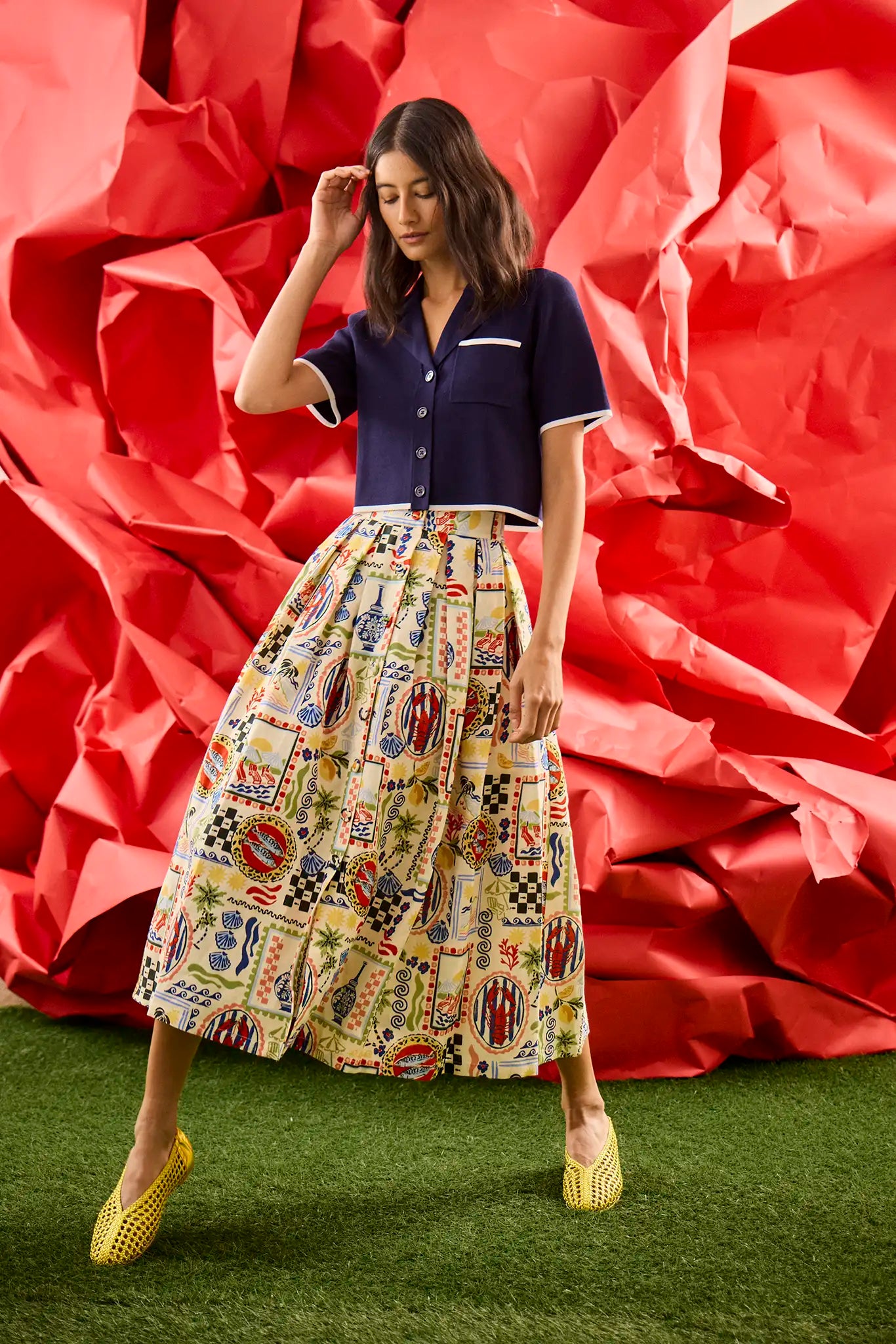 The Banff Sweater Top in Navy paired with our Eva Skirt in Coastal Conversation