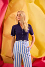 The Banff Sweater Top in Navy paired with our striped Juno Pant with blue and white stripes