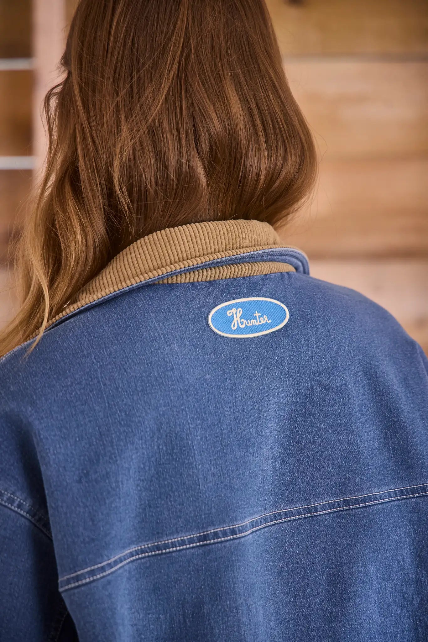 Oversized Indigo Blue barn jacket with contrast cuffs, roomy patch pocket and toggle front closure