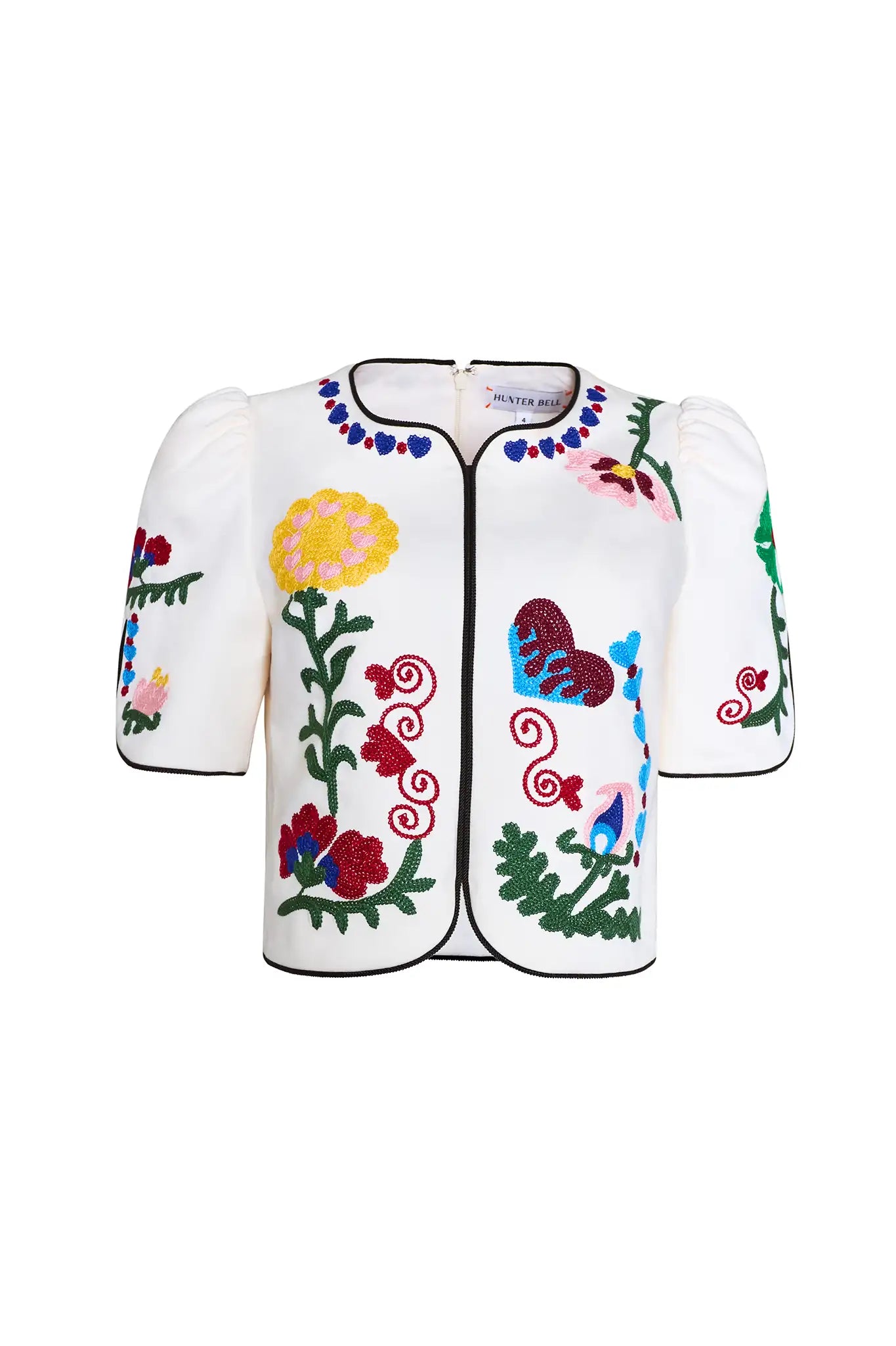 The Beeson Top is a crew neckline and elbow-length sleeves, non-fitted bodice with colorful detail