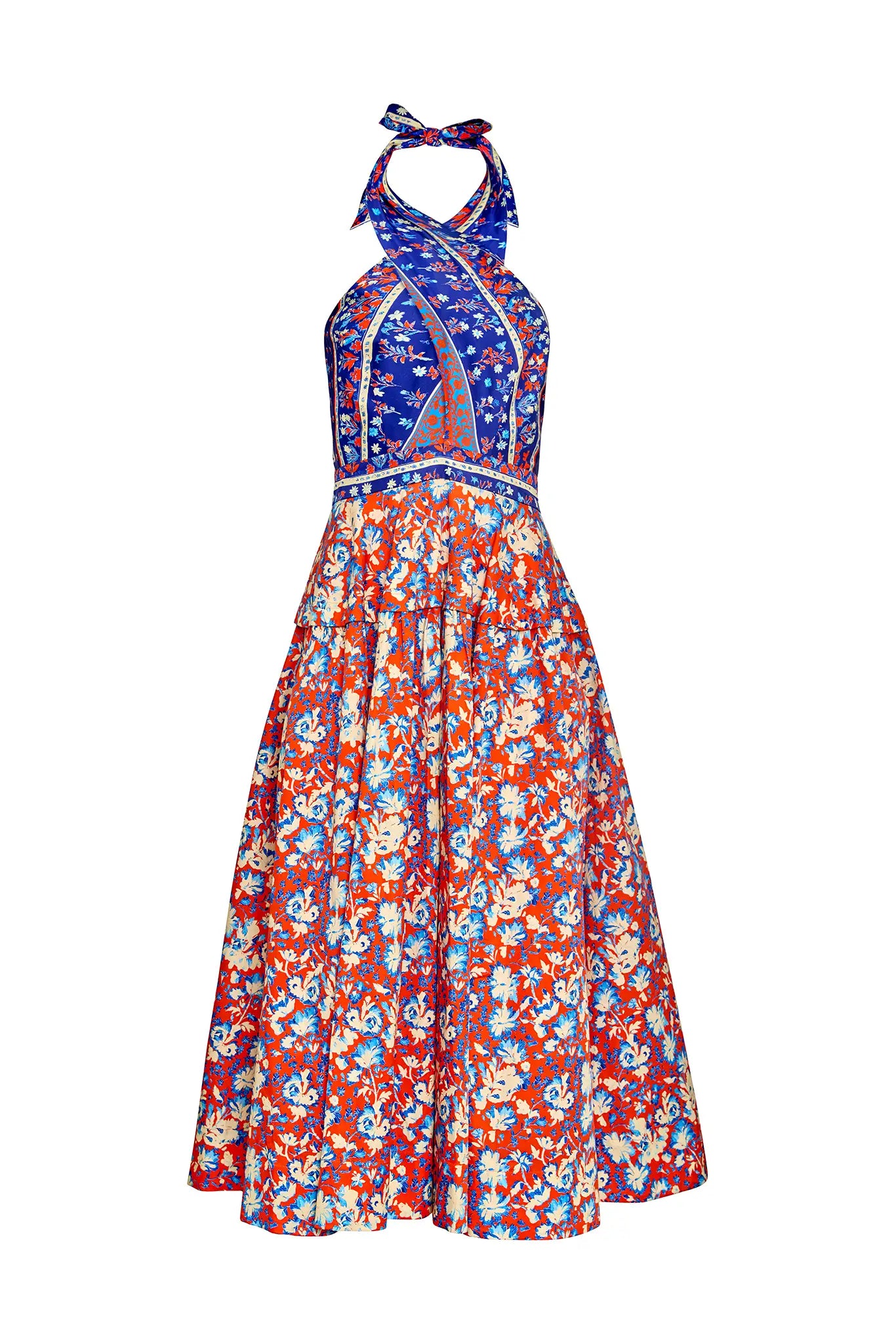 The Bellamy Dress is a criss cross halter dress with a full skirt and a clean side seam zipper.