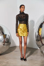 The Blaise Top in Noir Lace paired with the Britt Mini Skirt in Gilded Jacquard. 