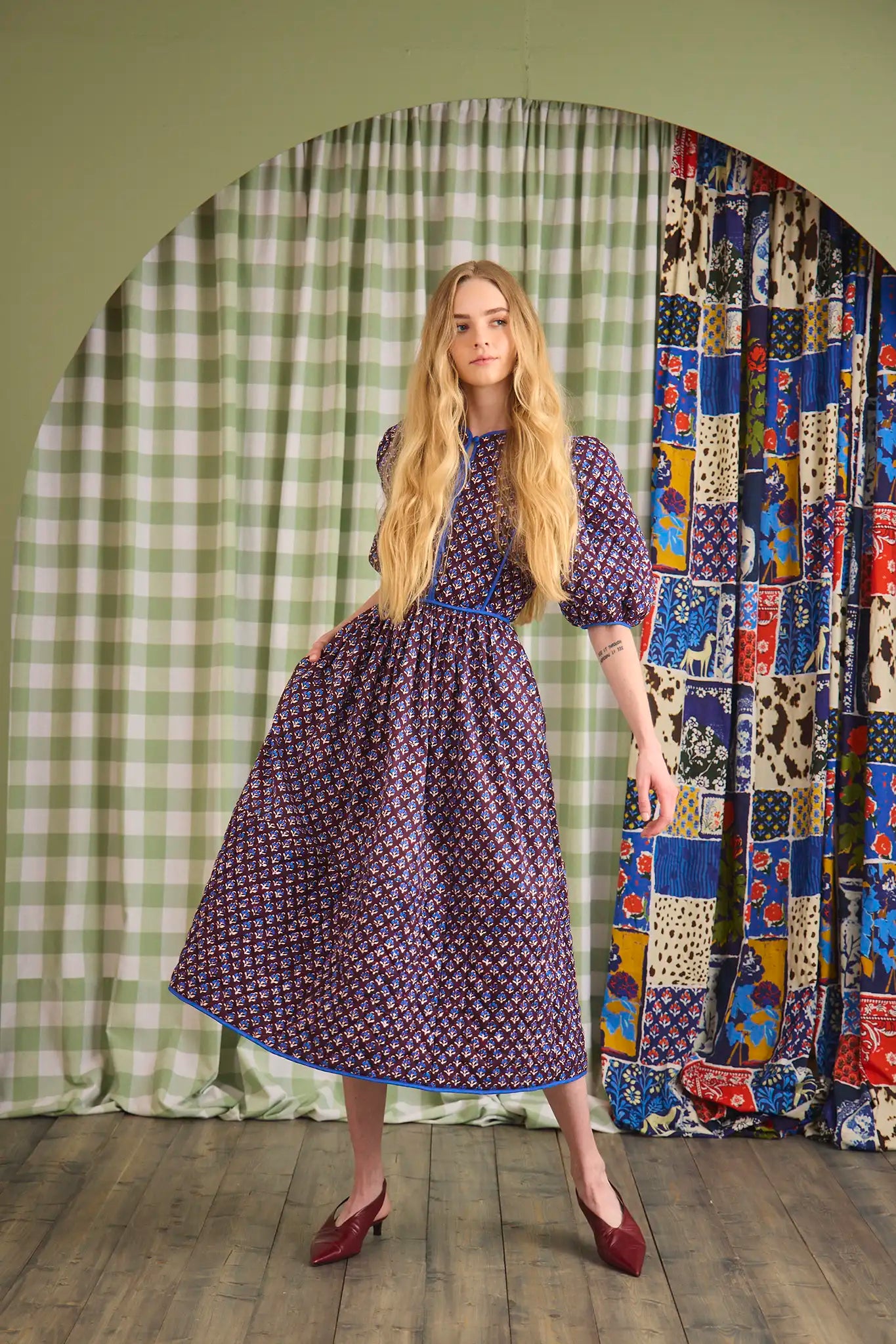 The Brenner Dress has a button-front placket with mini quilting and reverse contrast trim.