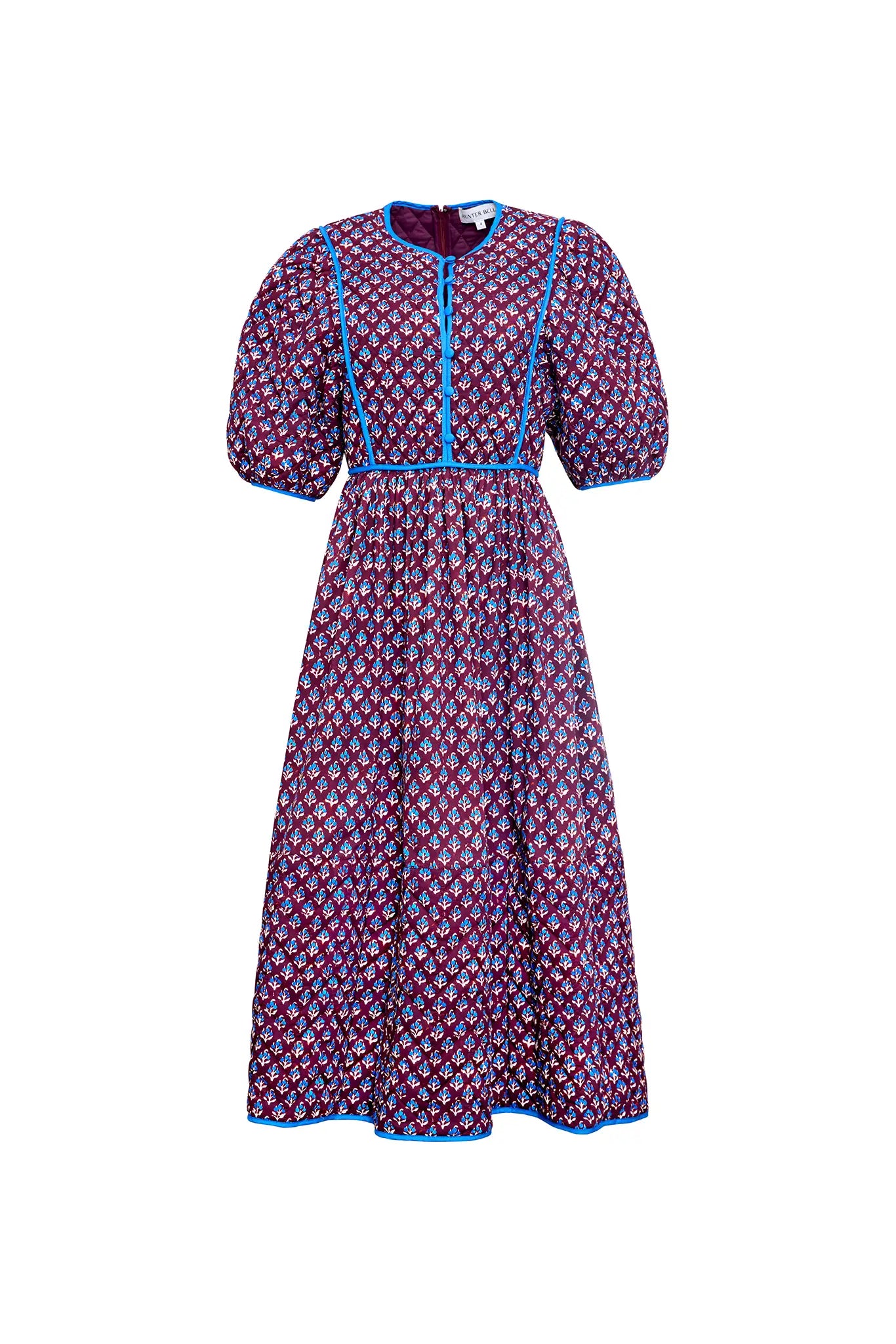 The Brenner Dress has a button-front placket with mini quilting and reverse contrast trim.