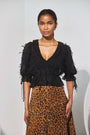 The Bridges Top in Manhattan Chiffon Onyx paired with the Ida Skirt in Soho Leopard Camel.