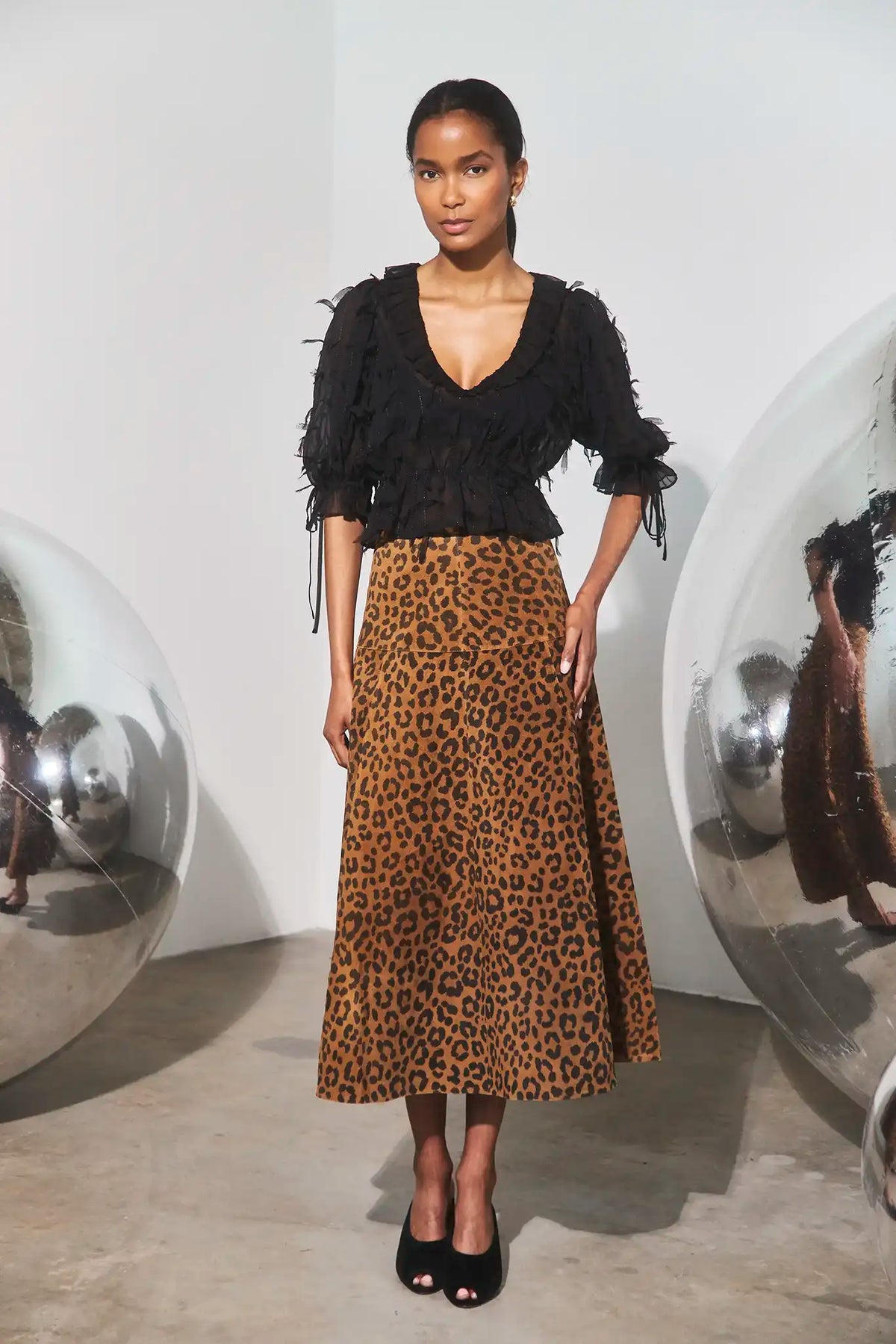 The Bridges Top in Manhattan Chiffon Onyx paired with the Ida Skirt in Soho Leopard Camel.