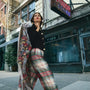 The Ridley Pant in Kensington Plaid Crimson paired with the Brooke Cardigan in Noir.