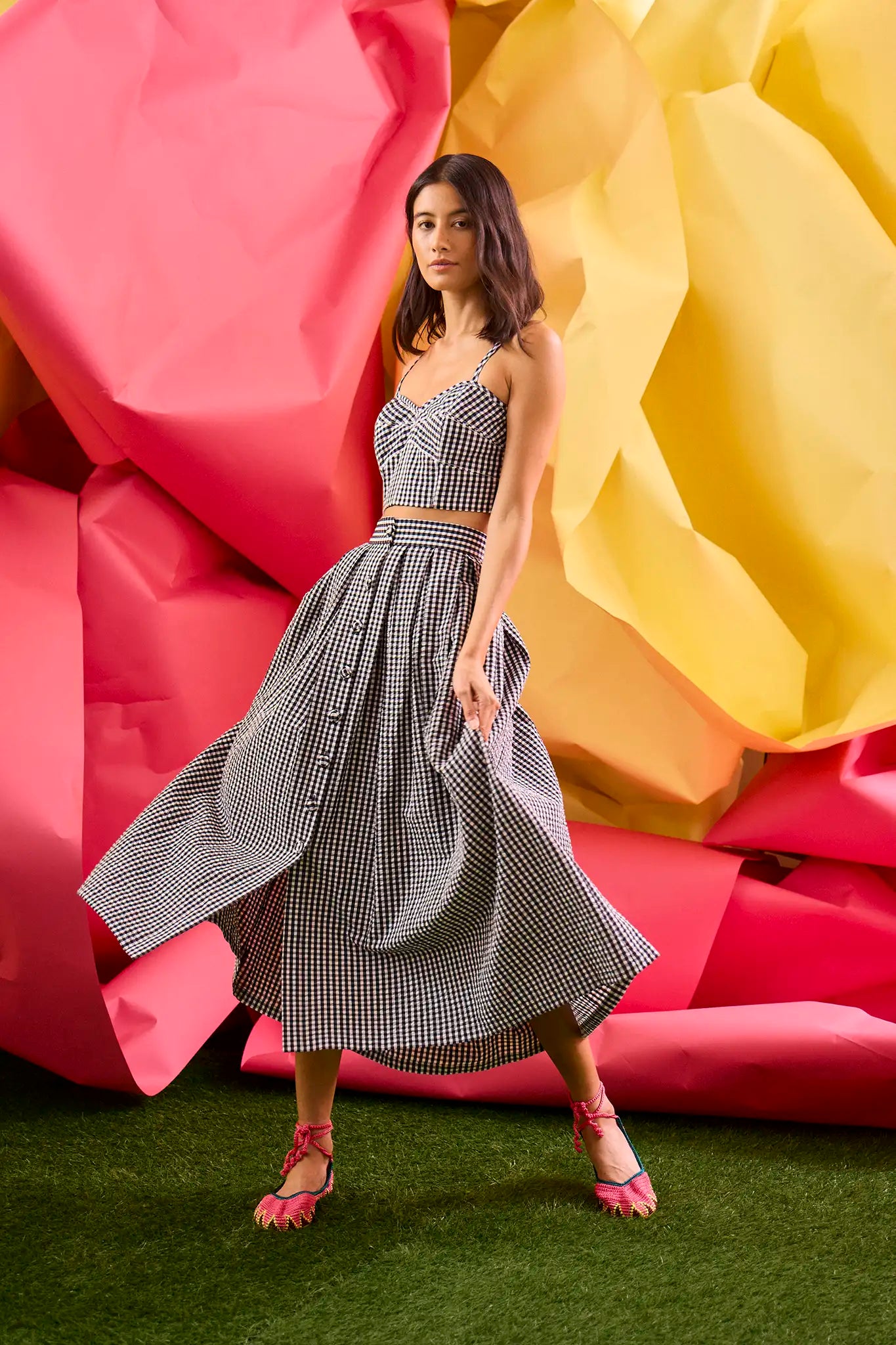 The Eva Skirt in black and white seersucker paired with matching Brookie Top, cropped tank top