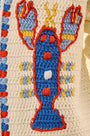 Close up of the Callen Cardigan in Lobster Multi