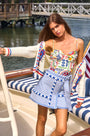 The Callen Cardigan in Lobster Multi paired with bathing suit in coastal conversation and bay skirt.