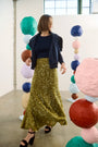 The Callie Sweater in Midnight Blue paired with Lindsey Skirt in Moss Sequin. 