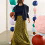The Callie Sweater in Midnight Blue paired with Lindsey Skirt in Moss Sequin. 