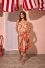 The Capri One Piece paired with the Sarong Cover up in Lost at Sea print.