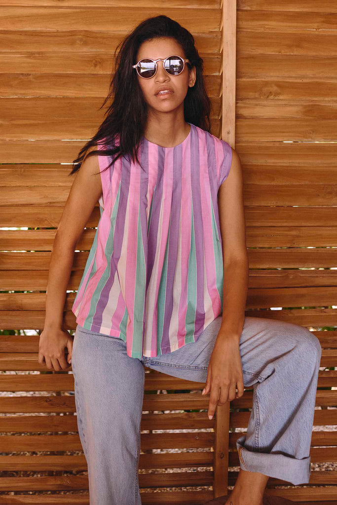 The Carlton trapeze top, a vibrant sleeveless top with a crew neck and a pleat and release bodice.
