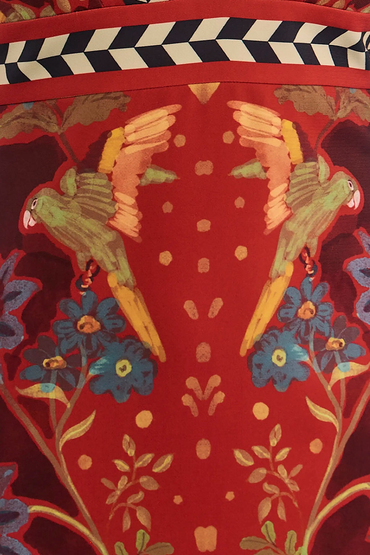 Close up of the Caroline Dress in Birds of a Feather Maroon. 