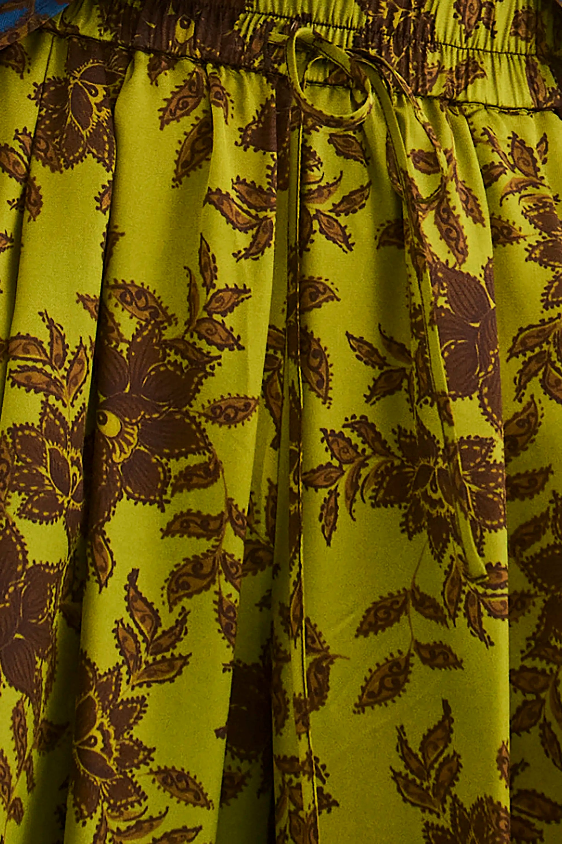 Close up of the Whisper Pant in Wild Vine Lime. 
