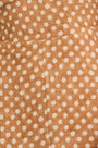 Close up of The Casey Dress in Coconut Sand Dot.