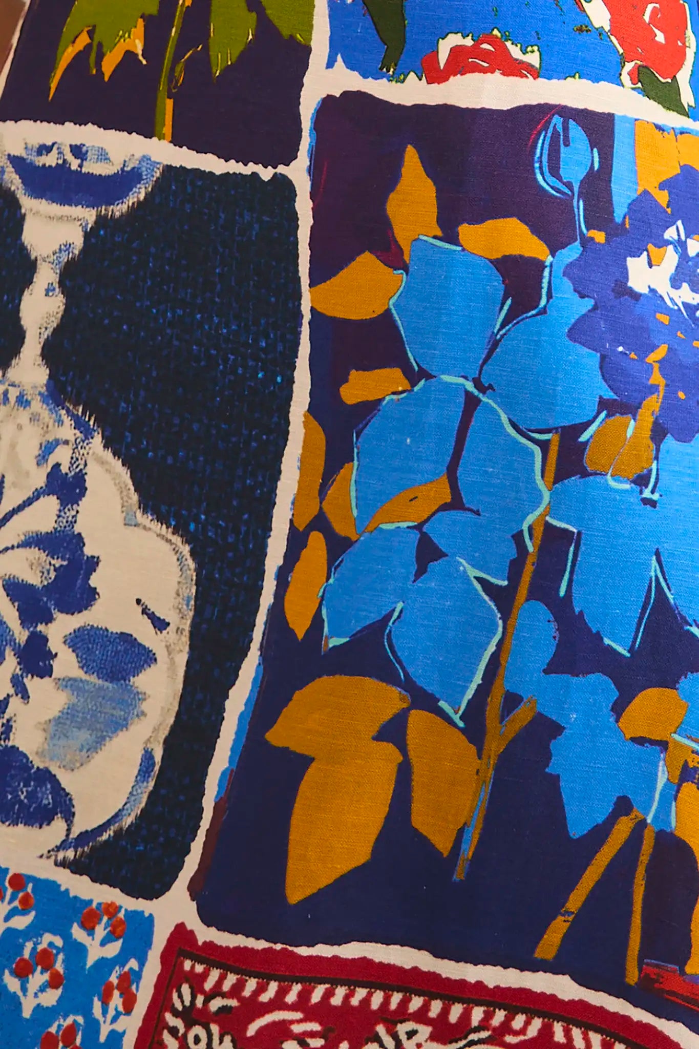 The Casey Dress is a sheath midi with a curved waist seam, relaxed skirt and pleated short sleeves.